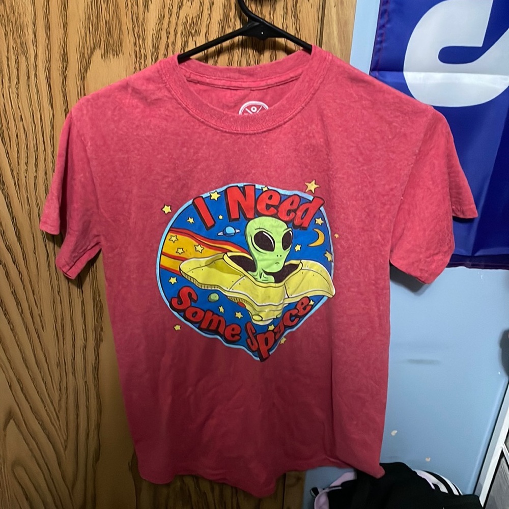 A red t-shirt slightly used